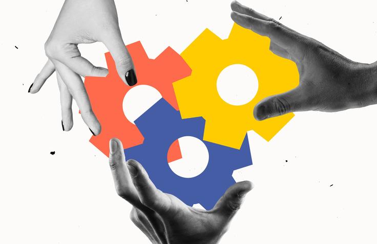 Three hands hold colorful, interlocking gears representing collaboration.