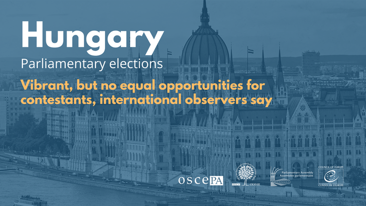 Blue-toned graphic of Budapest Parliament with election text overlay.